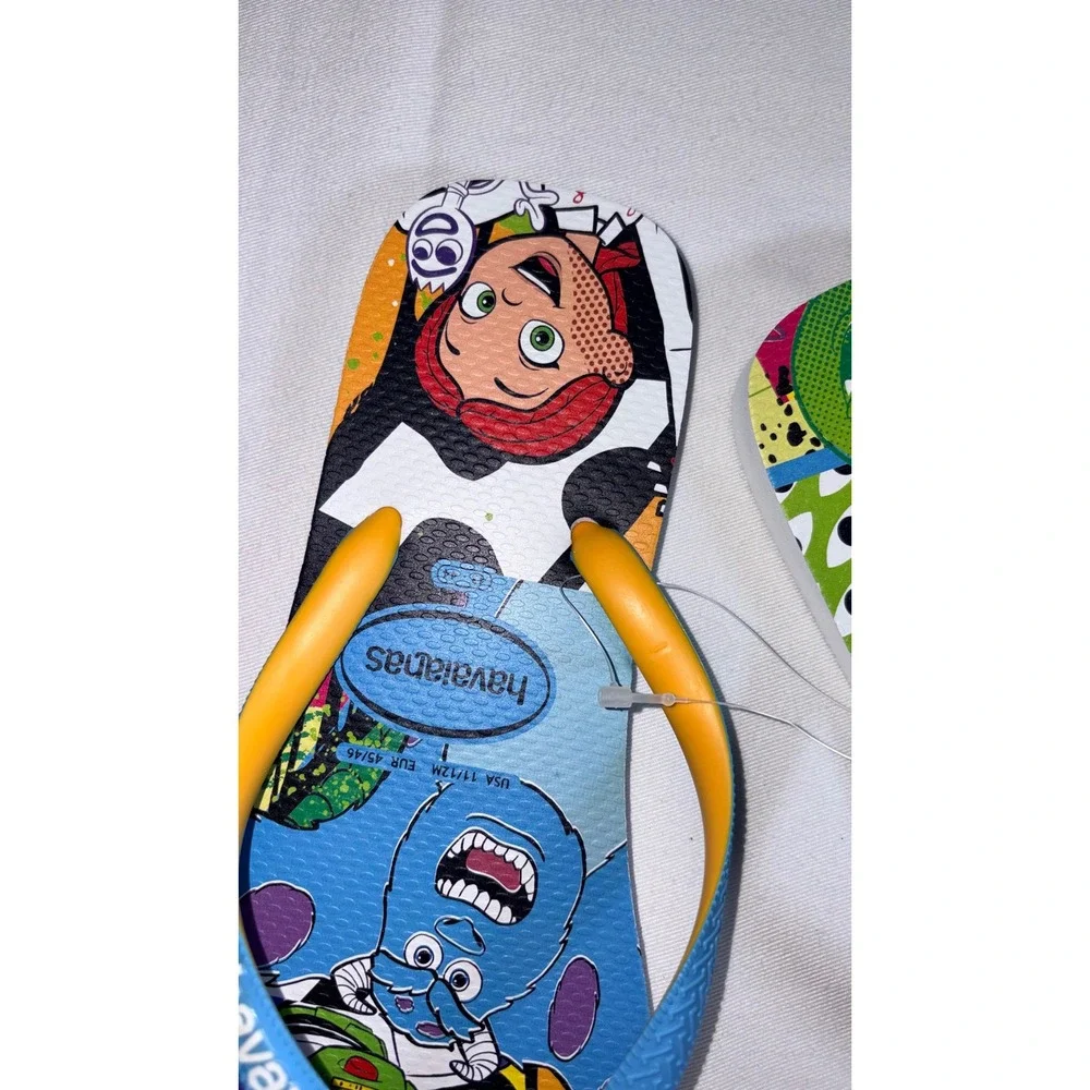 Havaianas Disney Pixar Flip Flops Size 11/12 White/Blue NEW Woody Buzz Sulley